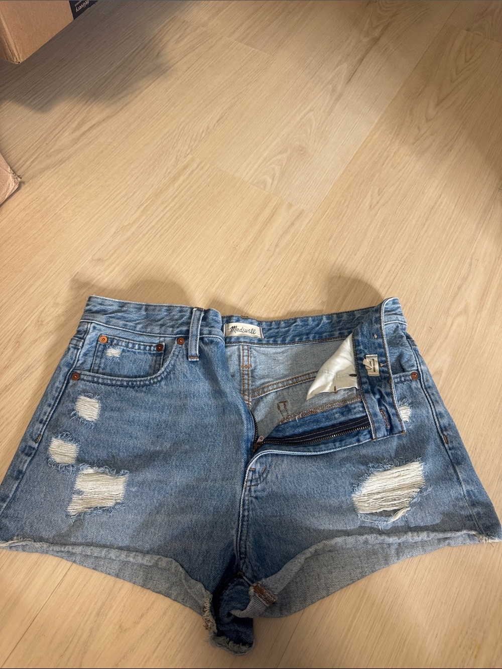 Madewell Distressed Light Blue Denim Shorts